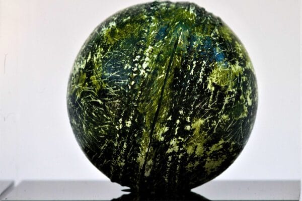 2025 Grassed acrylic primer, oil paint and protective varnish on Cricket ball with acrylic case 10x 10x10 cm (3)