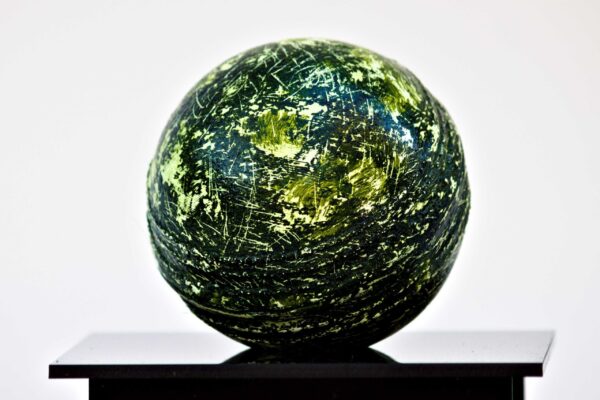 2025 Grassed acrylic primer, oil paint and protective varnish on Cricket ball with acrylic case 10x 10x10 cm